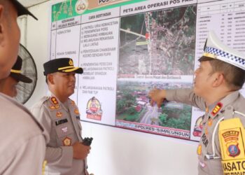 Kepala kepolisian Resor (Kapolres) Simalungun AKBP Marganda Aritonang, S.H. S.I.K. M.M melaksanakan pengecekan kesiapsiagaan di Pos Pelayanan I Pintu Tol Sinaksak