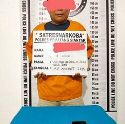 Tersangka IS dan barang bukti