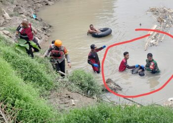 Jasad Bripka Aidil Ria Tambunan saat dievakuasi dipinggir Sungai Padang