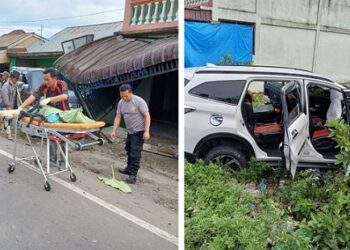 Jenajah Korban Reza Pardamean Pandiangan saat dievakusi  dan barang bukti mobil Toyota Rush nopol BK 1317 VS di TKP
