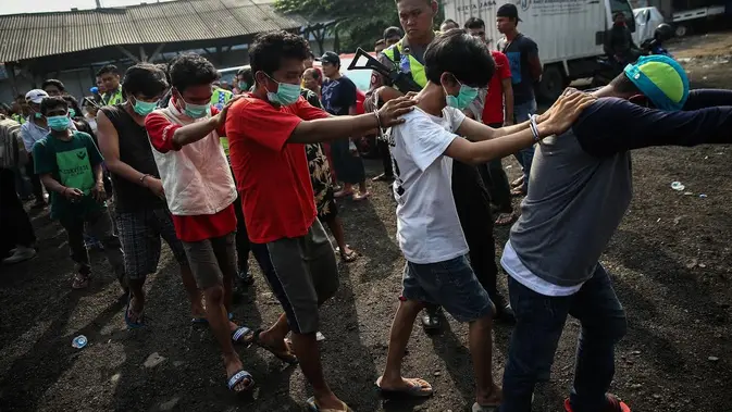 Polres Metro Jakut Amankan 12 Tersangka di Kampung Bahari