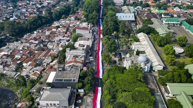 3.500 Warga Bogor Bentangkan Bendera Merah Putih 500 Meter