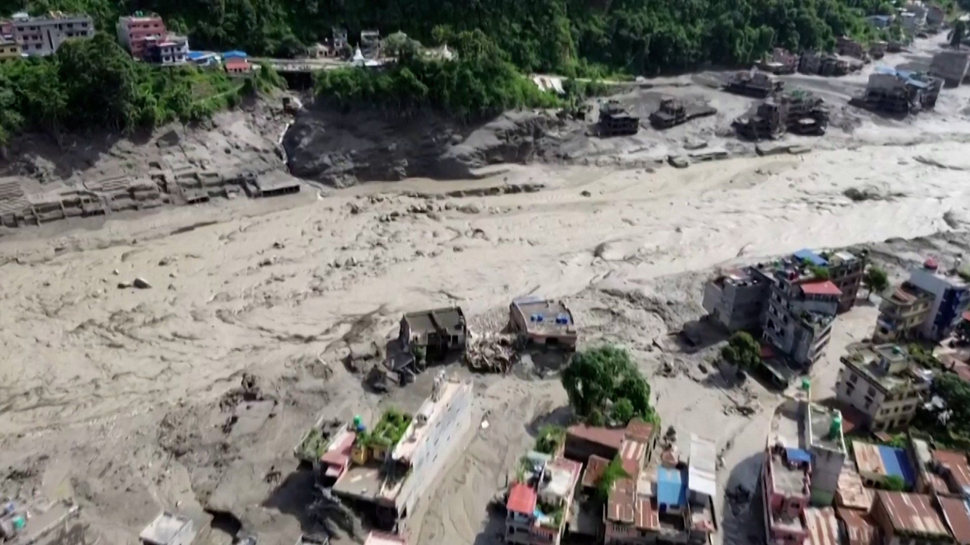 Flash floods leave at least eight dead and hundreds missing in northern Nepal