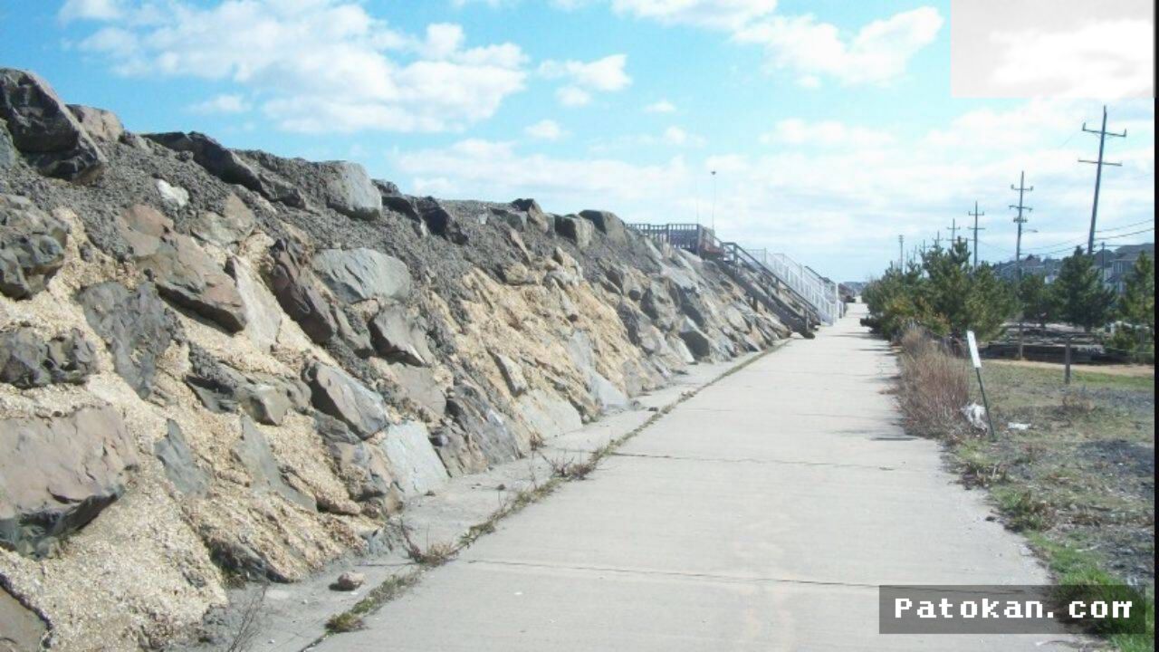 Amerika Serikat — Tanggul Raksasa New Jersey Melindungi Rumah Tapi Menghancurkan Pantai