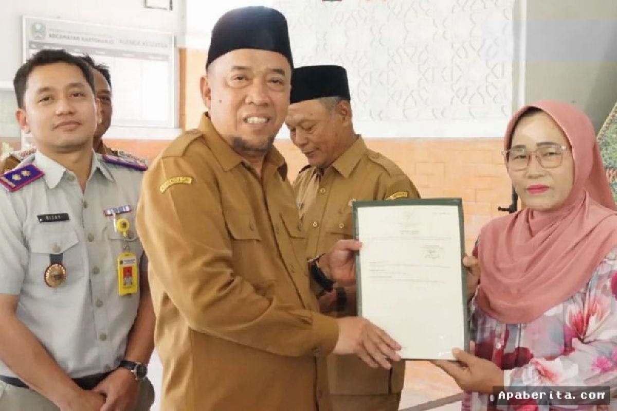 Pemkab Magetan Serahkan 451 Sertifikat Tanah PTSL untuk Warga Kartoharjo