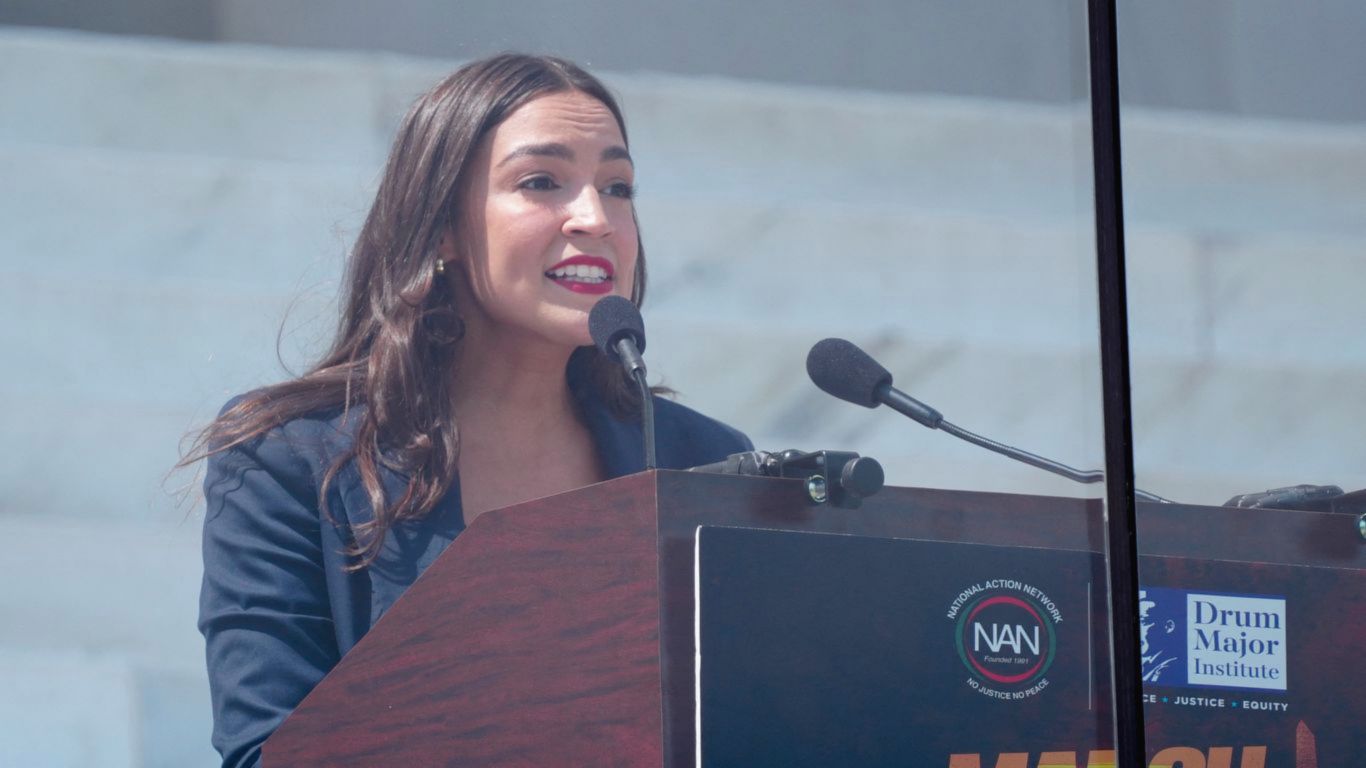 The user wants me to rewrite a news article about AOC's team