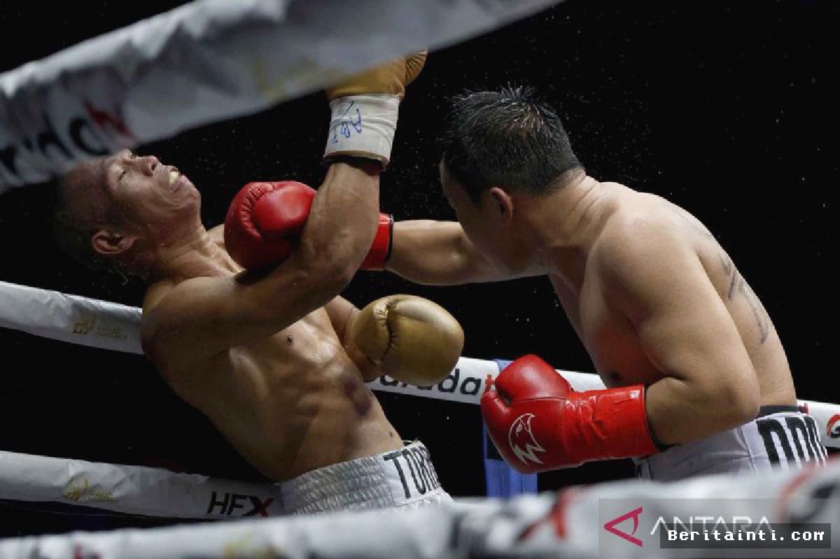 Daud Yordan Raih Sabuk ABF Usai Tumbangkan Petinju Filipina