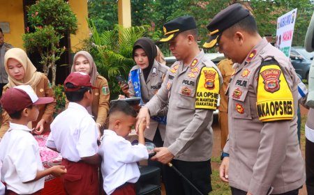 Polres Lampung Timur Bagikan Makan Bergizi Gratis di SDN Nyampir