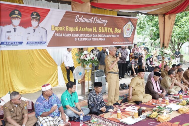 Bupati dan Wabup Asahan saat menghadiri acara Suroan. (mass)