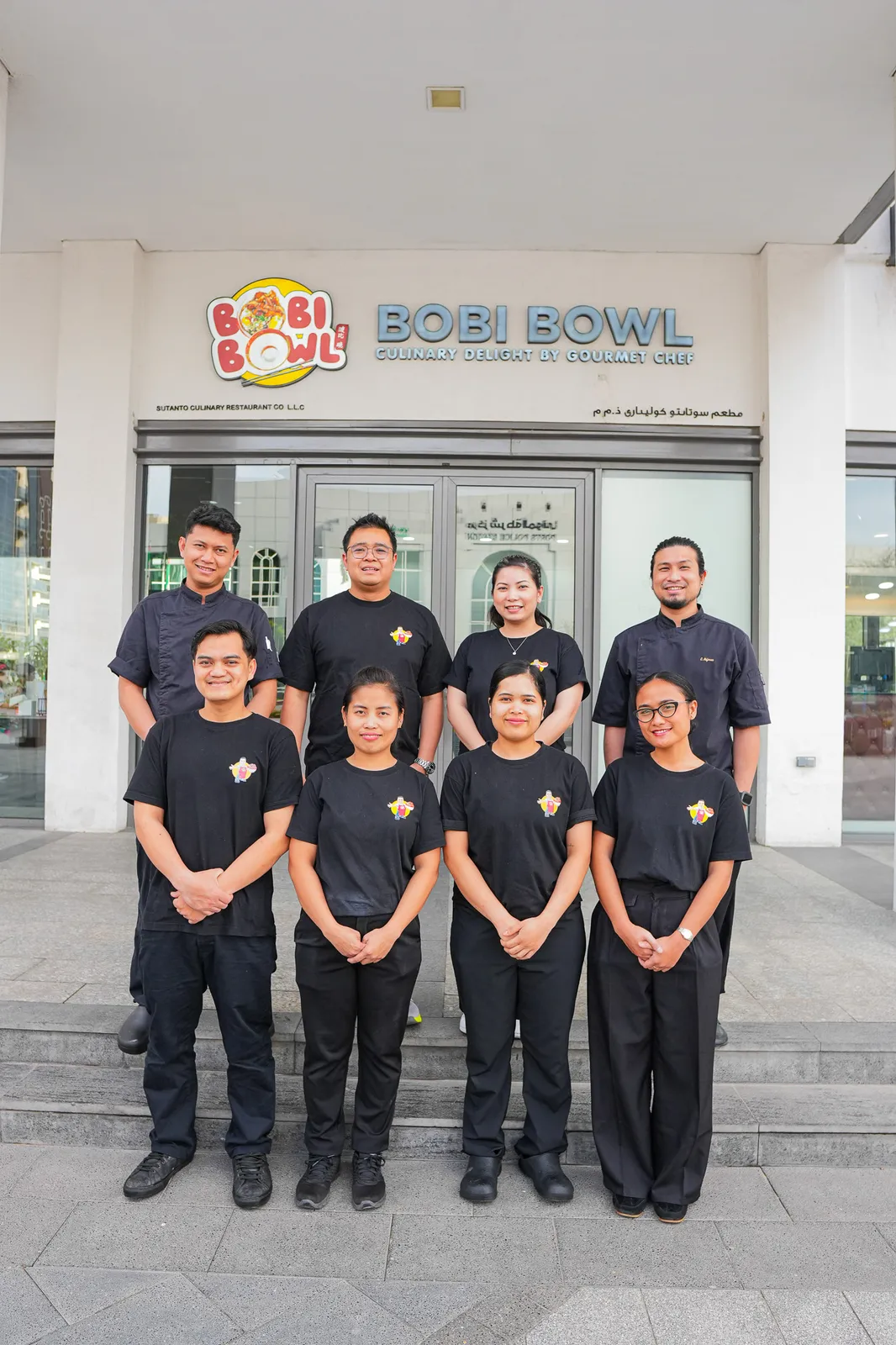 Bobi Bowl kitchen and service crew outside the restaurant