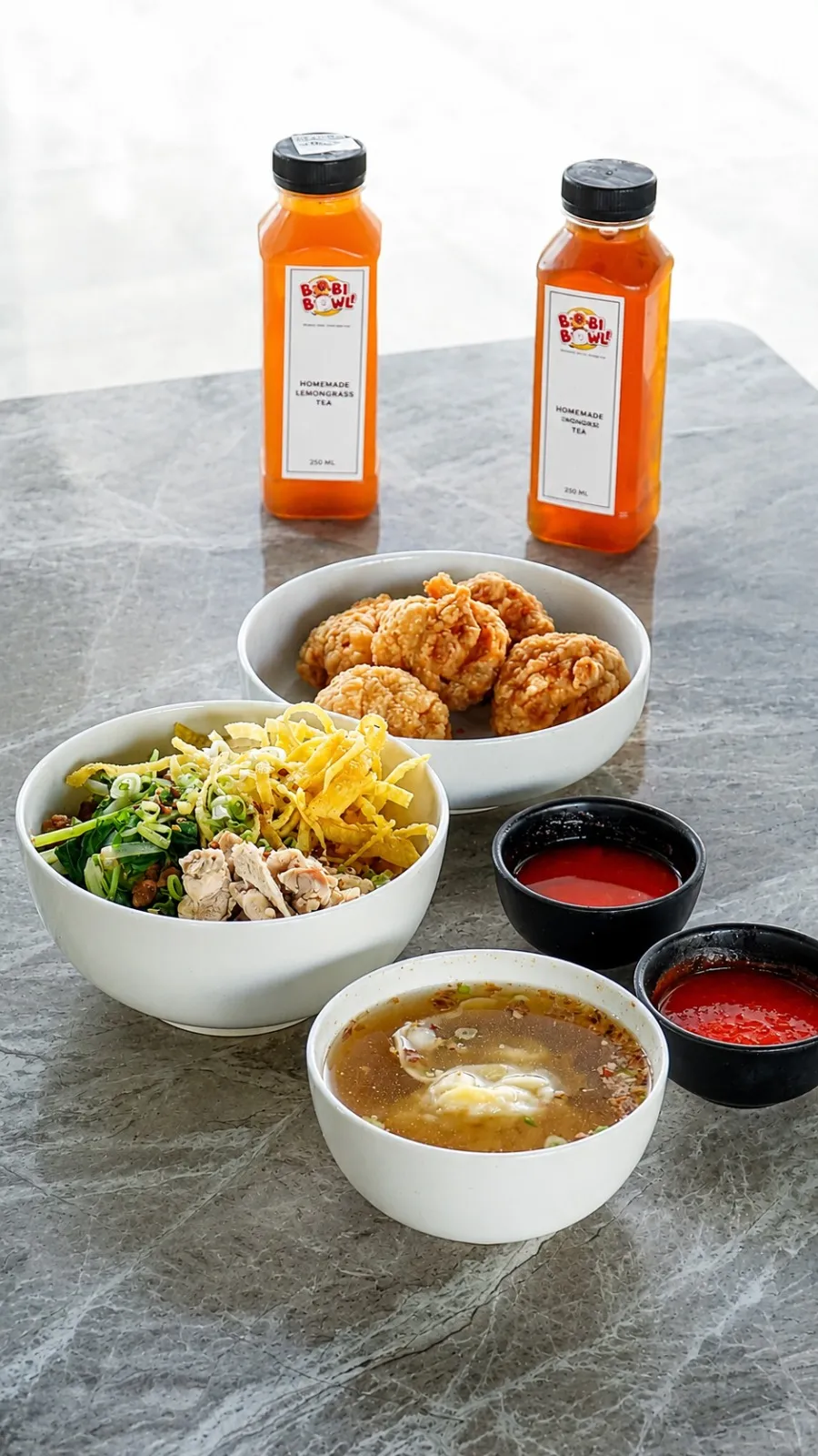 Mie ayam with fried meatballs, broth and house sauces