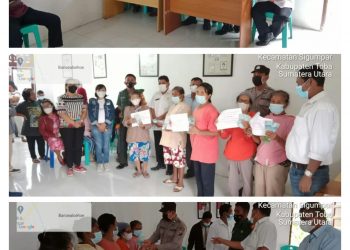 Personil Polsek Silaen saat Melakukan Pengawalan Pembagian BLT di Desa Sigumpar Kabupaten Toba