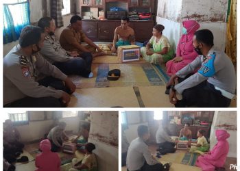 Kapolsek Kuantan Hilir AKP H. Yuhelmi bersama Rombongan memberikan bantuan kepada Abdul Mathalib korban Terkaman Beruang