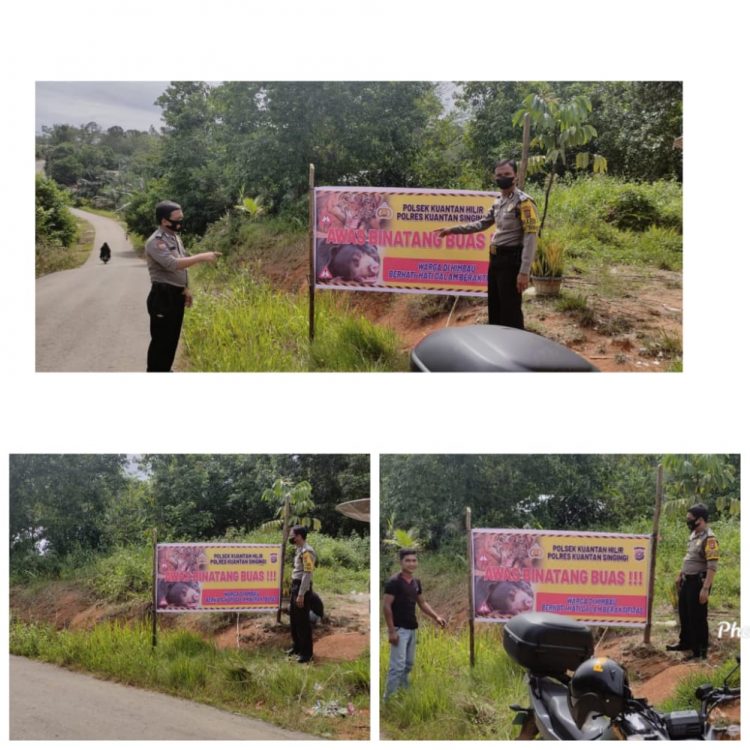 Polsek Kuantan Hilir memasang Banner himbauan kepada masyarakat terkait bahaya binatang buas