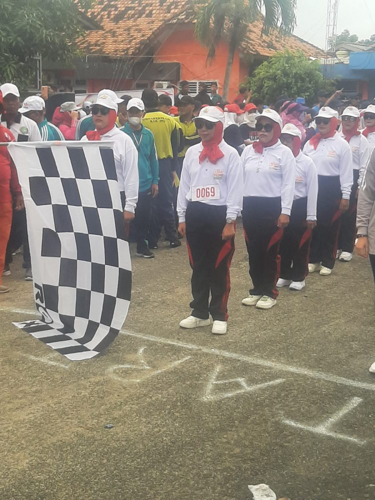 Lomba gerak jalan tepat waktu antar Sekolah tingkat SMA, SMK dan Antar OPD, BUMD serta Masyarakat di Kayuagung