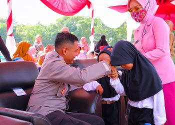 Kapolres Aceh Tamiang AKBP Imam Asfali, S.I.K bersama jajaran Forkopimda Aceh Tamiang menghadiri peringatan Hari Anak Nasional (HAN)