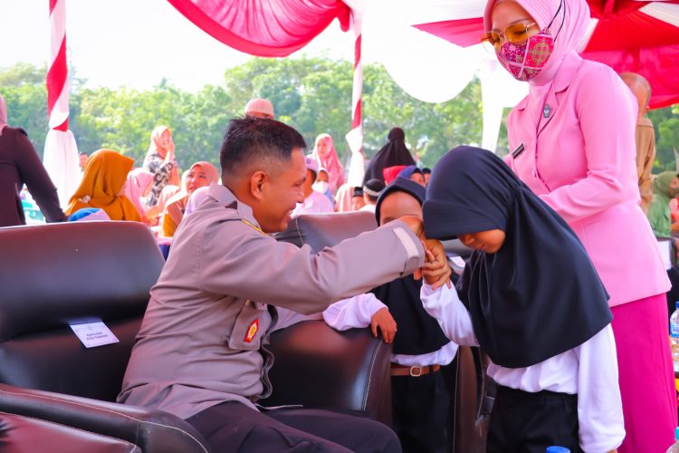 Kapolres Aceh Tamiang AKBP Imam Asfali, S.I.K bersama jajaran Forkopimda Aceh Tamiang menghadiri peringatan Hari Anak Nasional (HAN)