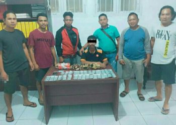 Pria berinsial SS (26) yang diduga sebagai pengedar obat keras jenis trihexiphenidyl di wilayah Kotamobagu