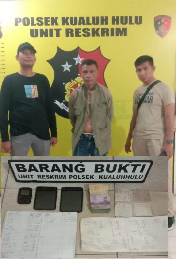 Diduga bandar togel jenis Hongkong di sebuah warung di pinggiran rel Kampung Teladan, Kelurahan Aek Kanopan, Kecamatan Kualuh Hulu, Kabupaten Labuhanbatu Utara ditangkap Tekab Reskrim Polsek Kualuh Hulu.