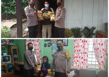 Bhabin Kamtibmas Polsek Parongil laksanakan giat bakti sosial (baksos) membagikan sembako kepada warga kurang mampu yang terdampak kenaikan BBM di Kelurahan Parongil
