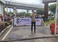 Puluhan massa tergabung dalam Lembaga Pemerhati Situasi Terkini (PST) melakukan aksi demonstrasi di Kejati Sumsel