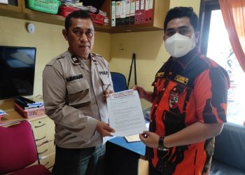 Parlindungan Sirait selaku ketua Sapma PP Simalungun melaporkan Santun Siallagan ketua kelompok 147 KK petani penggarap lahan PTPN IV Bah Jambi seluas 200 Ha ke Polres Simalungun