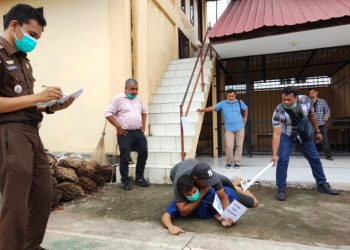 Polsekta Kotapinang menggelar 28 adegan rekontruksi pembunuhan korban Yogi Putra Pratama oleh tersangka HN alias Heri