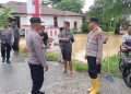 Wakapolres Langsa Kompol Ichsan, S.H meninjau kondisi banjir di Desa Geudubang Aceh