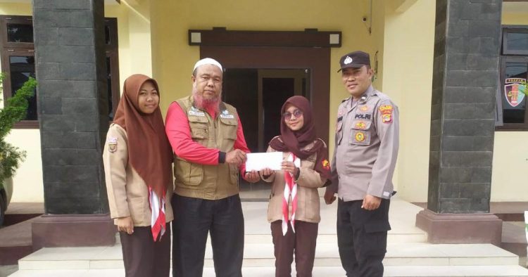 Polsek Talang Padang bersama Komunitas Masyarakat Cinta Polri (Komascipol) dan Pramuka Sakabhayangkara berhasil menggalang dana untuk korban gempa cianjur