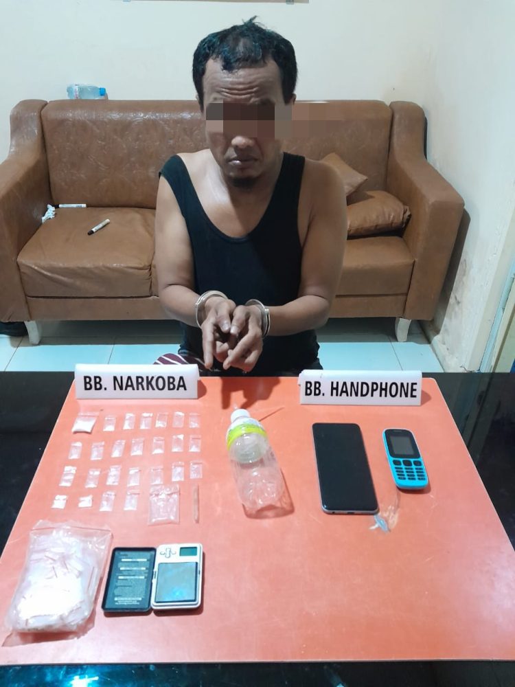 SB alias UK (41) warga Dusun Kampung Baru, Desa Naga Beralih, Kecamatan Kampar Utara, Kabupaten Kampar