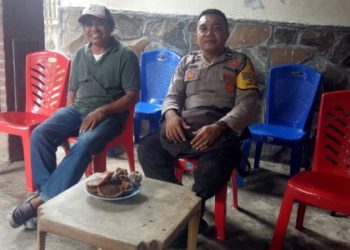 Bhabinkamtibmas Polsek Mapanget Aipda R. Bandola yang selalu hadir di tengah warga di wilayah binaan nya
