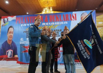 Ketua Umum (Ketum) Kornas Ganjarist, Kris Tjandra, meresmikan pelantikan dan deklarasi Satuan Relawan (Satrel) Provinsi Sumatera Selatan (Sumsel), Kota Palembang, Prabumulih dan Kabupaten Banyuasin, di gedung Serbaguna Graha Bandara Insani, Talang Jambe Palembang