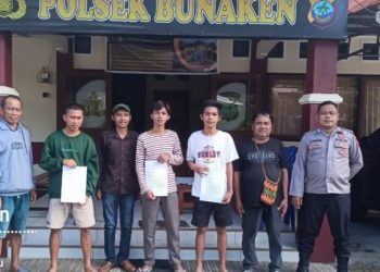 Personel Polsek Bunaken, melaksanakan mediasi kasus panganiayaan yang melibatkan warga di Kelurahan Pandu, Lingkungan VI Kecamatan Bunaken