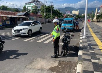Personel Sat Lantas Polresta Manado melaksanakan pengaturan, penjagaan, pengawalan dan patroli (Turjawali) di wilayah hukum Polresta Manado, Jumat (24/3/2023) pagi