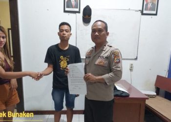 Personel Polsek Bunaken, melaksanakan mediasi kasus perusakan barang yang melibatkan warga di Kelurahan Bailang, Lingkungan II Kecamatan Bunaken