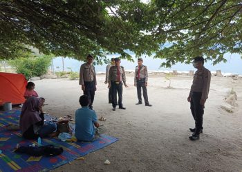 Kasat Pam Obvit Polres Dairi AKP LP Sinaga bersama Personil Sat Pengaman Objek Vital (Sat Pam Obvit) Polres Dairi melaksanakan kegiatan patroli di objek wisata DPSP ( Distinasi Pariwisata super prioritas) Tao Silalahi