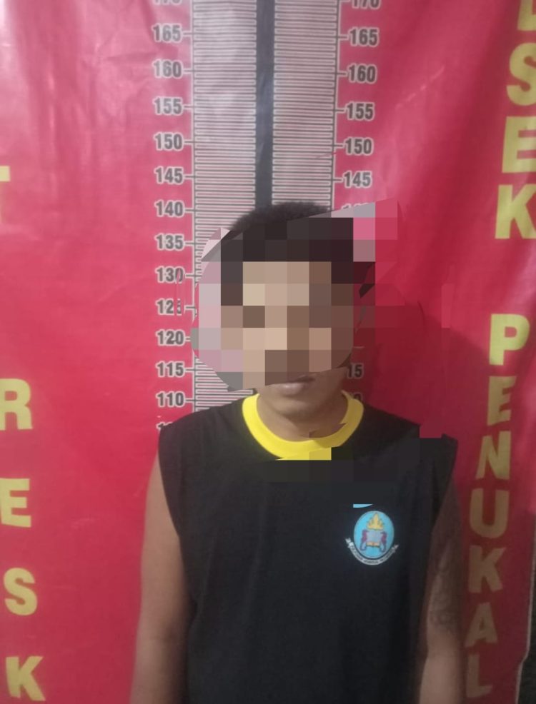 Pria bernama Aroma (33) terduga kasus dugaan tindak pidana pengancaman terhadap Amran (45) pada Minggu (9/4/2023)