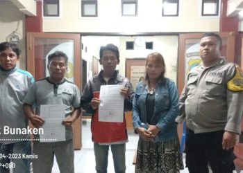 Personel Polresta Manado damaikan permasalahan warga yang melakukan penganiayaan di kelurahan Tongkaina, Kecamatan Bunaken