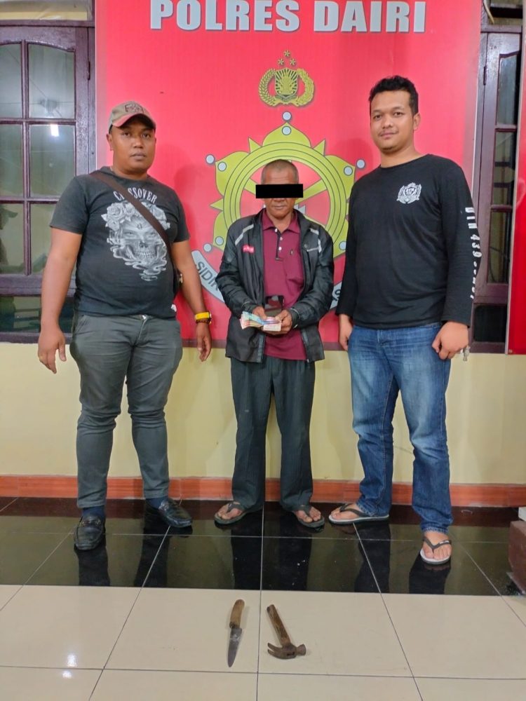 Laki laki dewasa terduga pelaku tindak pidana pencurian dengan pemberatan yang terjadi pada hari jumat 14/4/23 di jalan maha bunga desa gunung meriah kecamatan siempat nempu hulu kabupaten Dairi tepatnya di rumah korban Hamid Sagala