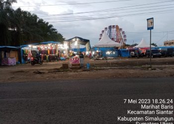 Ramainya acara pasar malam yang digelar di Jalan Asahan, Kecamatan Siantar, Kabupaten Simalungun tepatnya di depan sekolah dasar (SD) Negeri 095551 Jalan Asahan Batu IV Simalungun