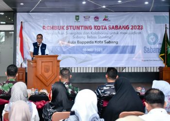 Pj Wali Kota Sabang ketika membuka Rembuk Stunting Tingkat Kota Sabang Tahun 2023, yang berlangsung di Aula Bappeda, Rabu (10/5/23)
