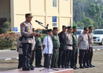 Kapolres PALI AKBP Khairu Nasrudin SIK MH memimpin apel Ketua Satuan Keamanan Lingkungan (Satkamling), pada Rabu 21 Juni 2023