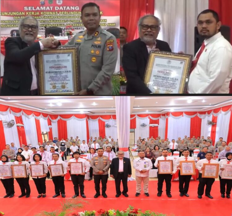 Kapolres Labuhanbatu AKBP James H. Hutajulu dan Bupati Labuhanbatu Utara Hendrianto Sitorus menerima penghargaan dari Komnas Perlindungan Anak (Komnas PA).