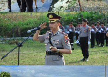 Kapolres Samosir beserta Ketua Bhayangkari Cabang Samosir Ny. Widia Hardiman melaksanakan Upacara dan Tabur Bunga di makam pahlawan Sidamdam yang terletak di Desa Rianiate, Kecamatan Pangururan, Kabupaten Samosir