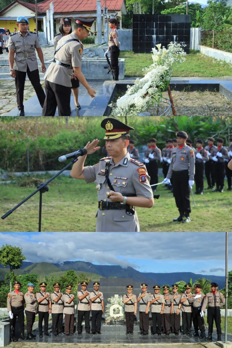 Kapolres Samosir beserta Ketua Bhayangkari Cabang Samosir Ny. Widia Hardiman melaksanakan Upacara dan Tabur Bunga di makam pahlawan Sidamdam yang terletak di Desa Rianiate, Kecamatan Pangururan, Kabupaten Samosir