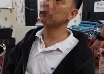 Pelaku KDRT atau penganiayaan berinisial RL (32), warga Kelurahan Pakowa Kecamatan Wanea.