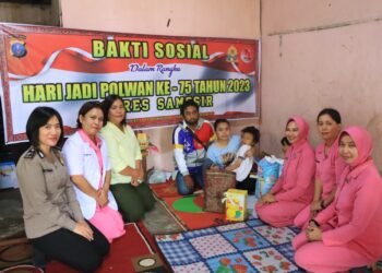Bakti Sosial Polwan Polres Samosir di Desa Pardomuan I, Kabupaten Samosir