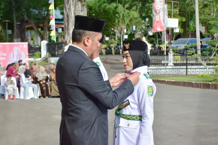 Pemerintah Kota Sabang gelar Upacara Pengukuhan Tanda Bakti Paskibraka Dalam Rangka HUT Kemerdekaan Republik Indonesia Ke-78 Tahun 2023 di halaman Pendopo Wali Kota Sabang, Selasa (15/08/2023).