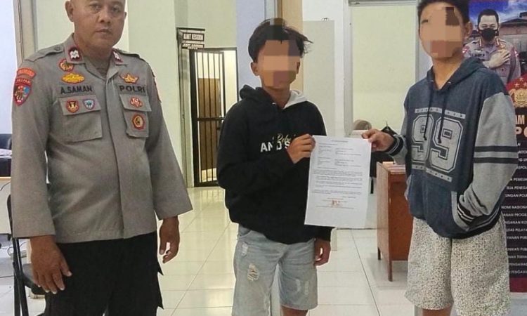 Personel Polsek Tombulu Manado damaikan permasalahan warga yang melakukan penganiayaan di di Desa Sawangan, Kecamatan Tombulu, Sabtu (19/8/2023).