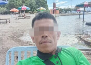 Oknum Ketua Panitia Pilpanag Nagori Pondok Buluh bermarga Nainggolan